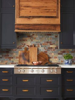Blue cabinets rusty brown slate backsplash tile BA1063