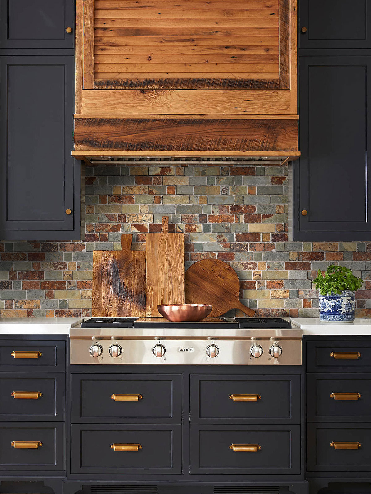 Blue cabinets rusty brown slate backsplash tile BA1063