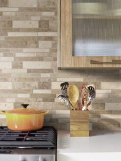 white quartz countertop with travertine brown backsplash tile