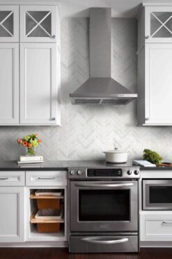 Farmhouse Transitional Kitchen Black Granite Countertop Chevron Backspash Tile