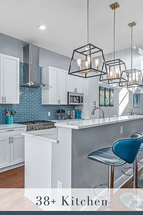 White Cabinets with Blue Backsplash