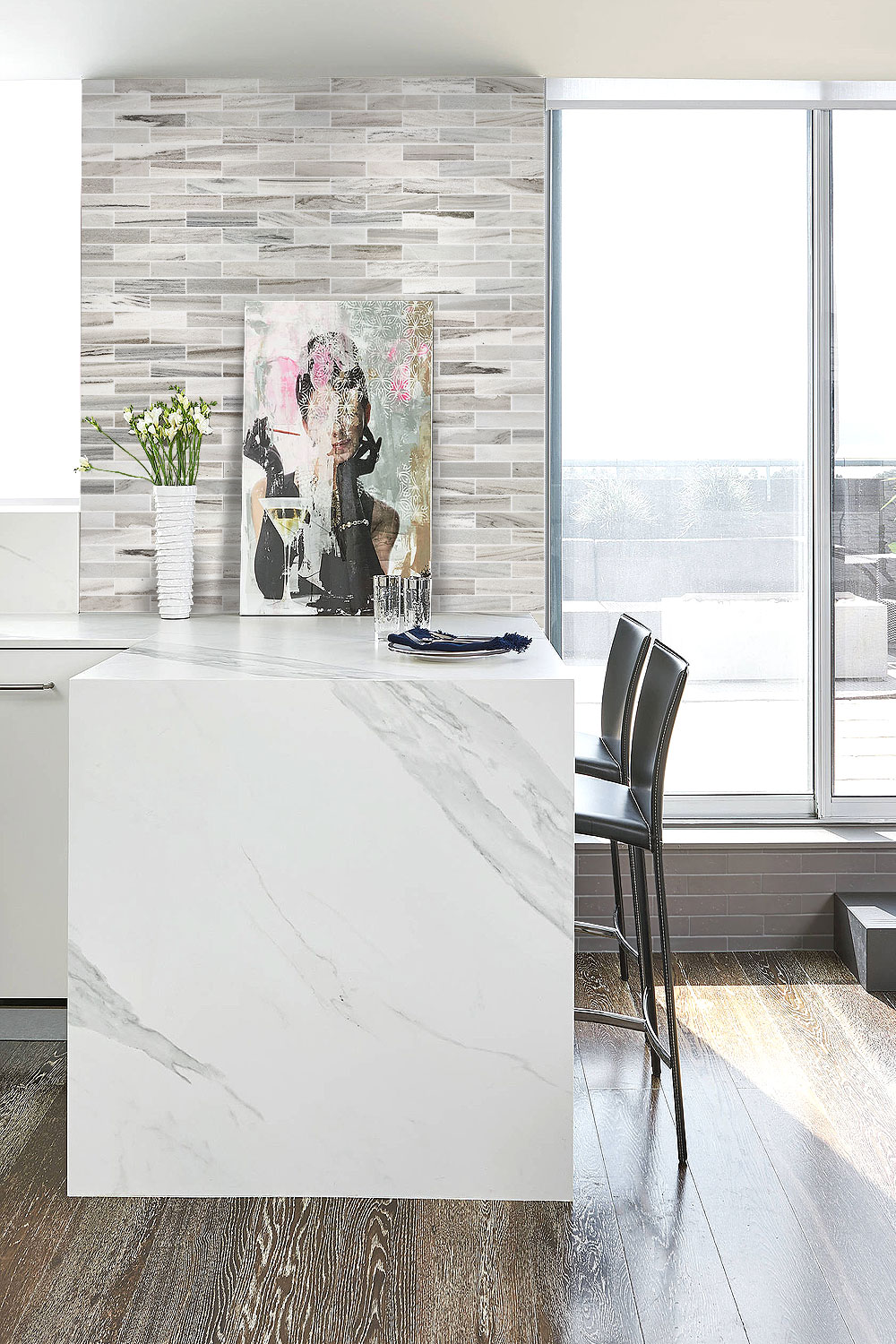white countertop island full wall backsplash tile