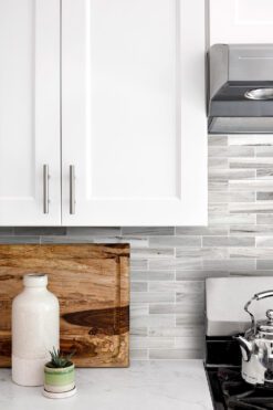 white kitchen quartz countertop marble backsplash tile
