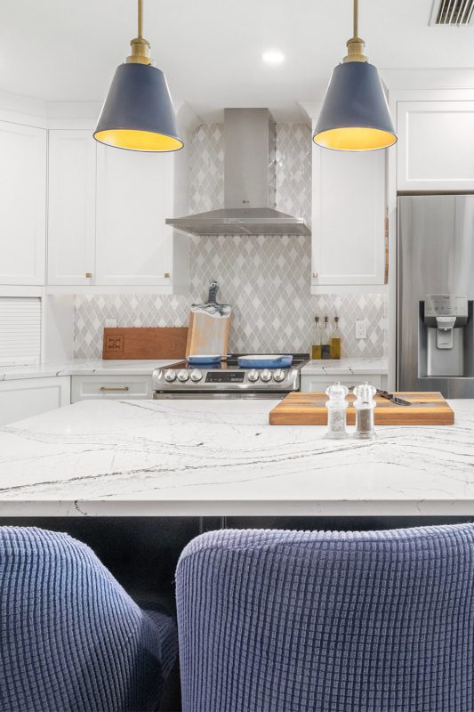 White Kitchen Cabinet White Countertop With Dark Veins White Backsplash Tile BA62046