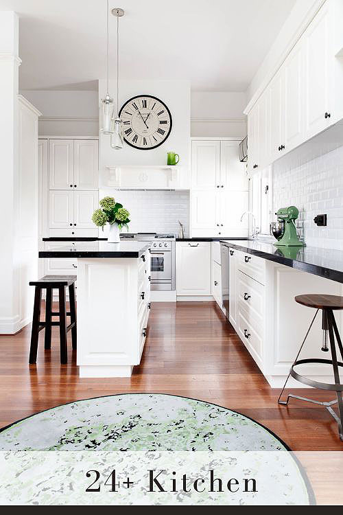 White Subway Backsplash with Black Countertop