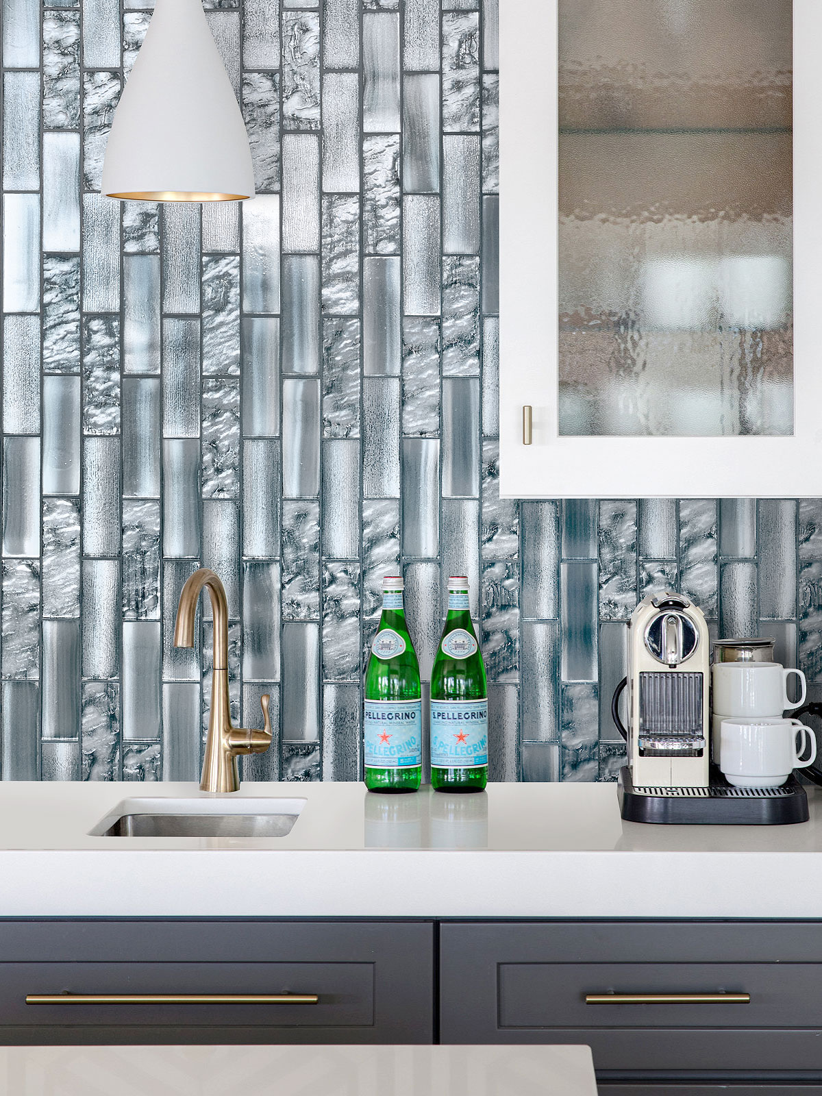 Blue Cabinets with Space Blue Subway Glass Backsplash Tile