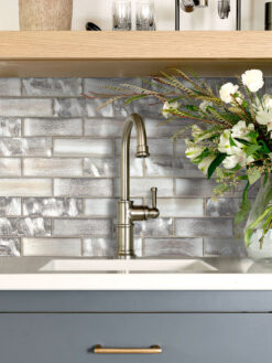 Graay kitchen cabinets with Space Brown Subway Glass Backsplash Tile