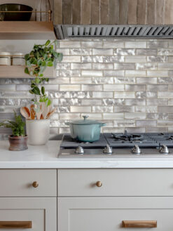 Gray Cabinet with Space Brown Subway Glass Backsplash Tile