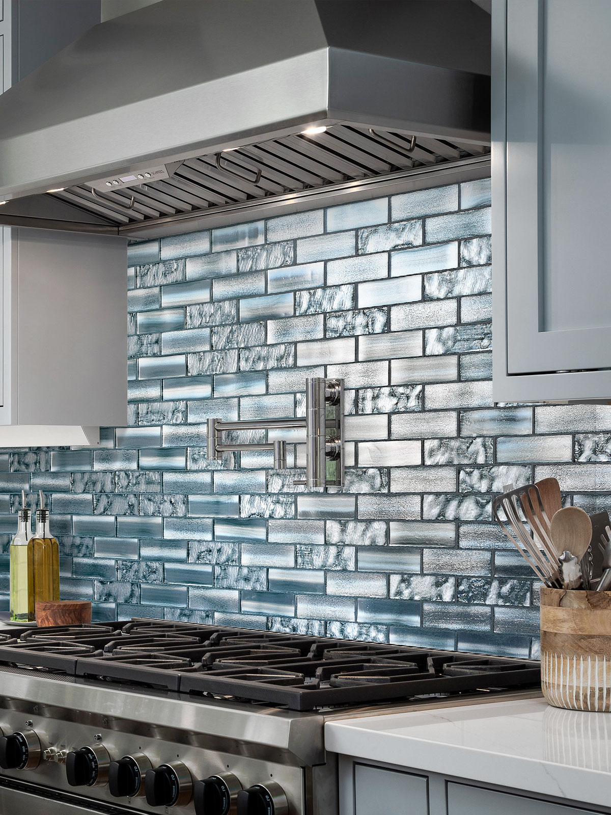 Gray Cabinets with Space Blue Subway Glass Backsplash Tile