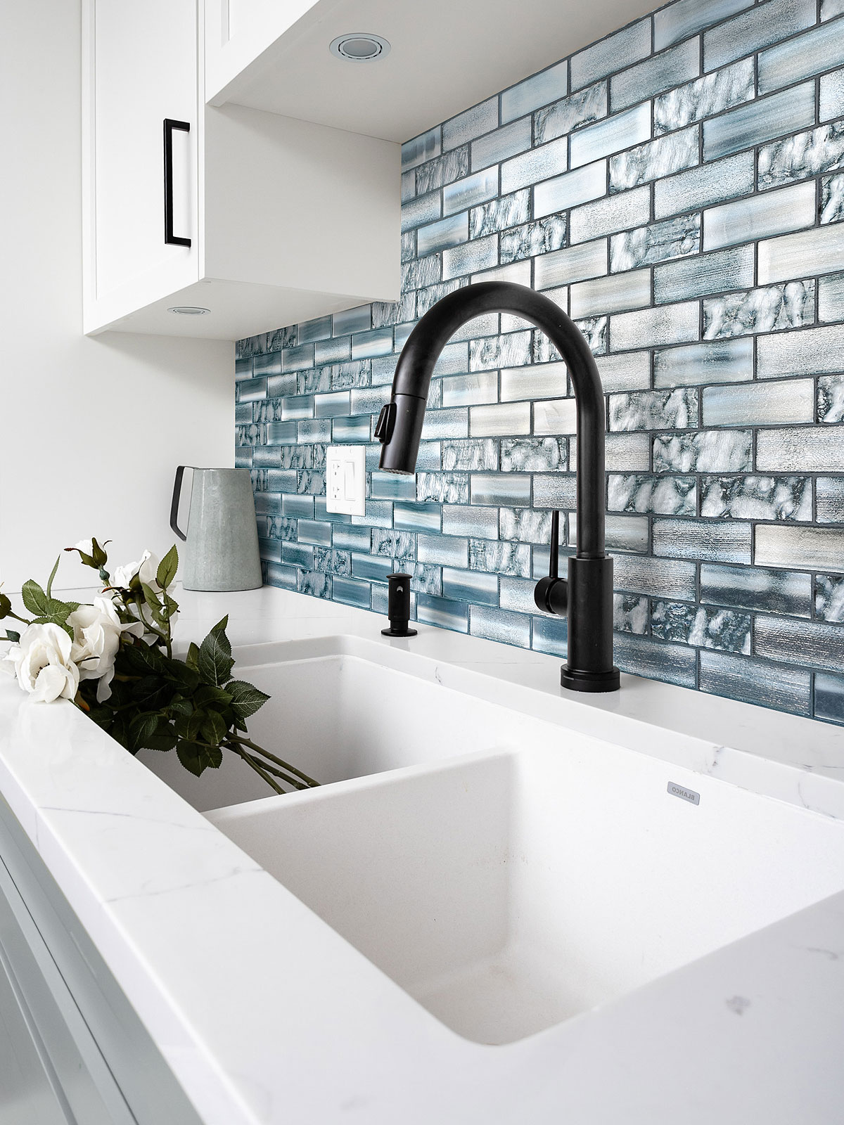 White Quartz Top with Space Blue Subway Glass Backsplash Tile