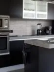 Black kitchen cabinets gray countertop backplash tile BA1038