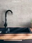 Gray modern limestone backsplash black faucet BA1038