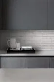 Contemporary Kitchen Dark Gray Cabinet Quartz Countertop And Backsplash