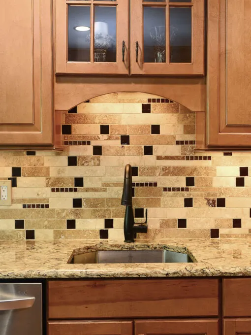 Brown cabinets quartz countertop travertine backsplash tile BA1025