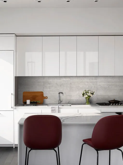 Modern white kitchen with gray backsplash tile