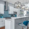 White Cabinets with Blue Backsplash