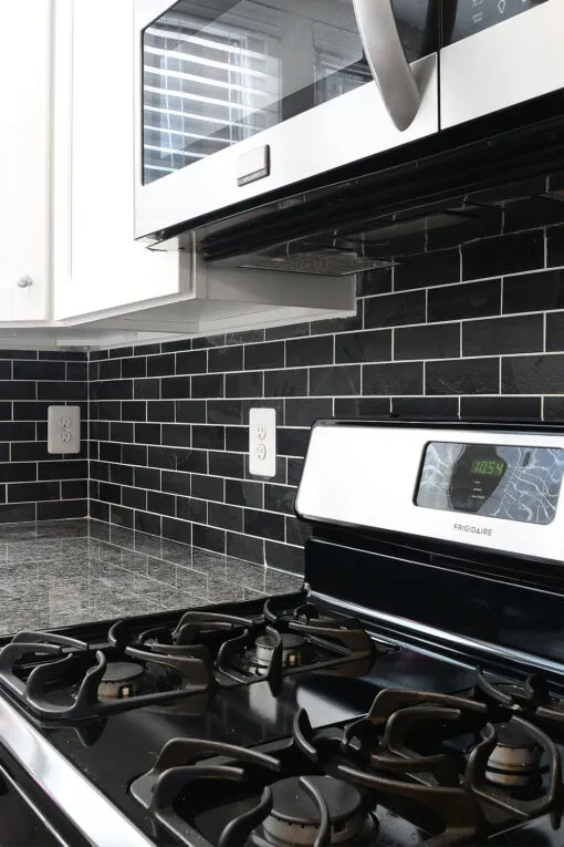 gray granite countertop white cabinet black slate mosaic tile BA1070