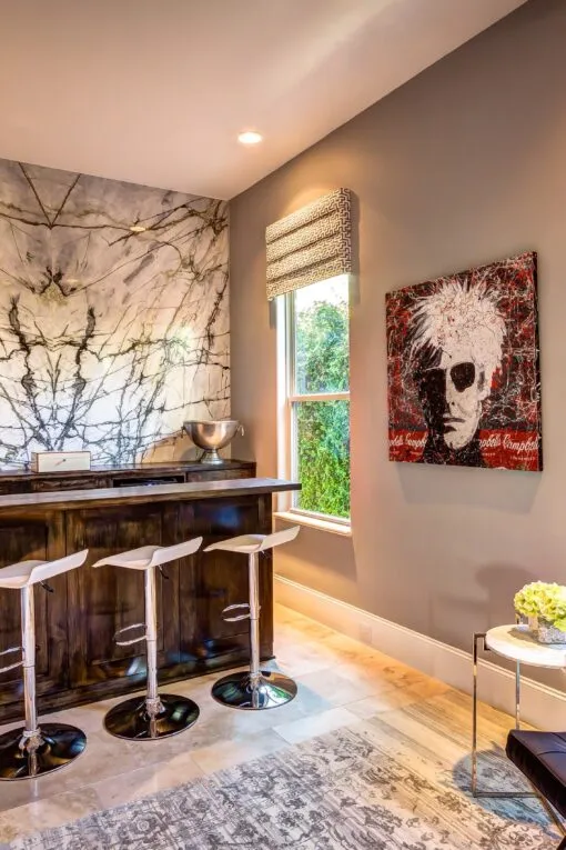 Contemporary Home Bar with Dark Wood Cabinets and Calacatta Verde Bookmatched Tile