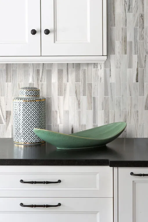 white cabinet black granite countertop subway marble backsplash tile