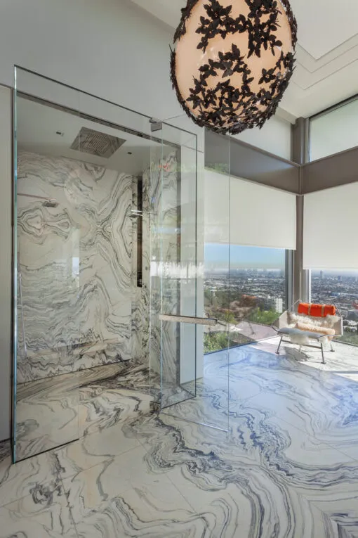 Luxurious Master Bathroom with Cippolino Marble Bookmatched Tile and Stunning City View