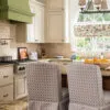 antiqued ivory subway backsplash tile idea