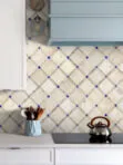 White Kitchen Cabinet with Light Travertine Tile Blue Glass BA1029