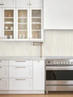 Modern Beige Backsplash Tile with White Kitchen Cabinets
