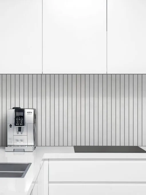 Modern europan kitchen with Modern light gray long backsplash tile